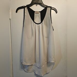 Fashion Magazine Black and White Sleeveless Blouse